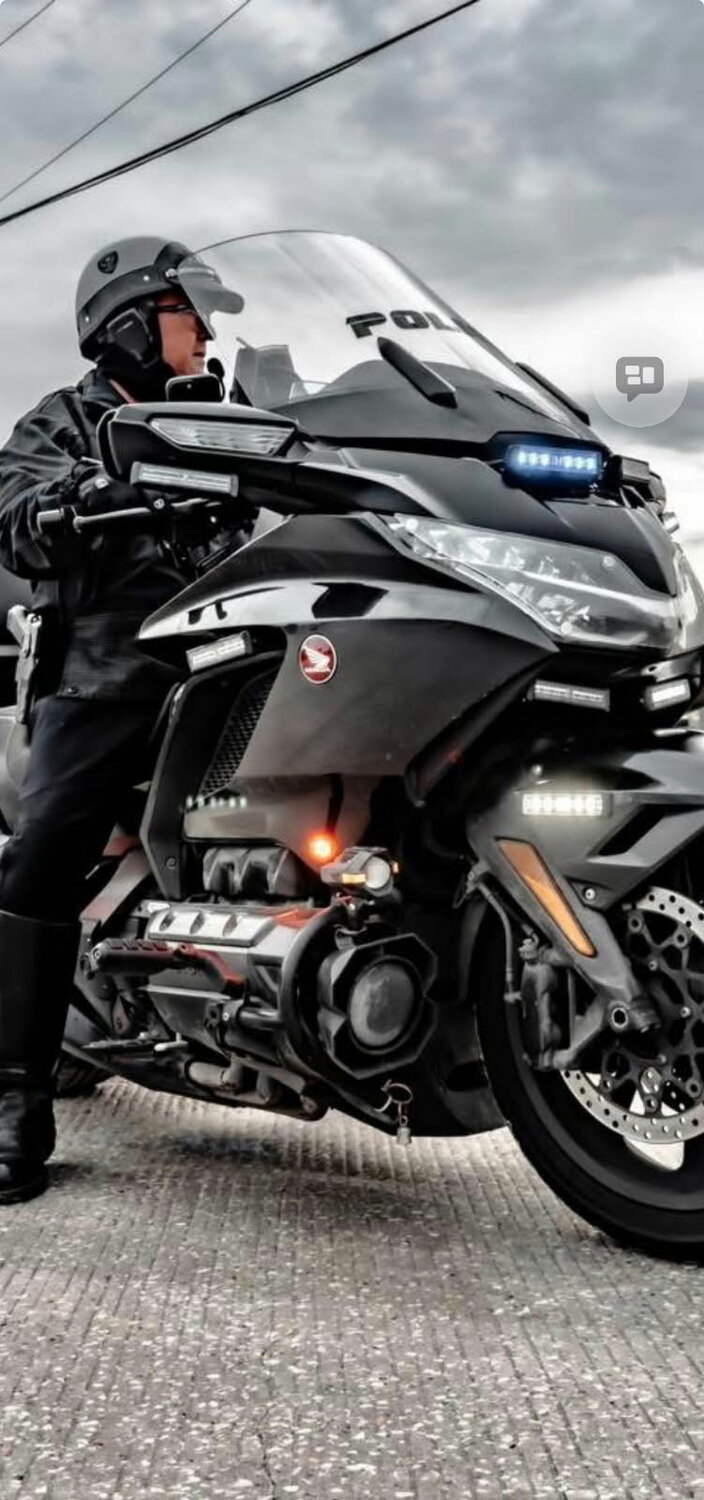 Chief Clint Headley and his motorcycle.